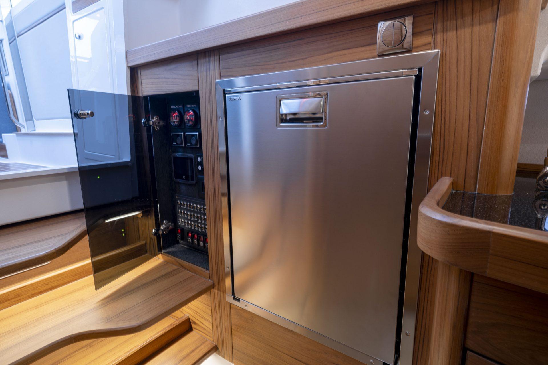 Interior of Nimbus Commuter 11, 2025, featuring stainless steel paneling.