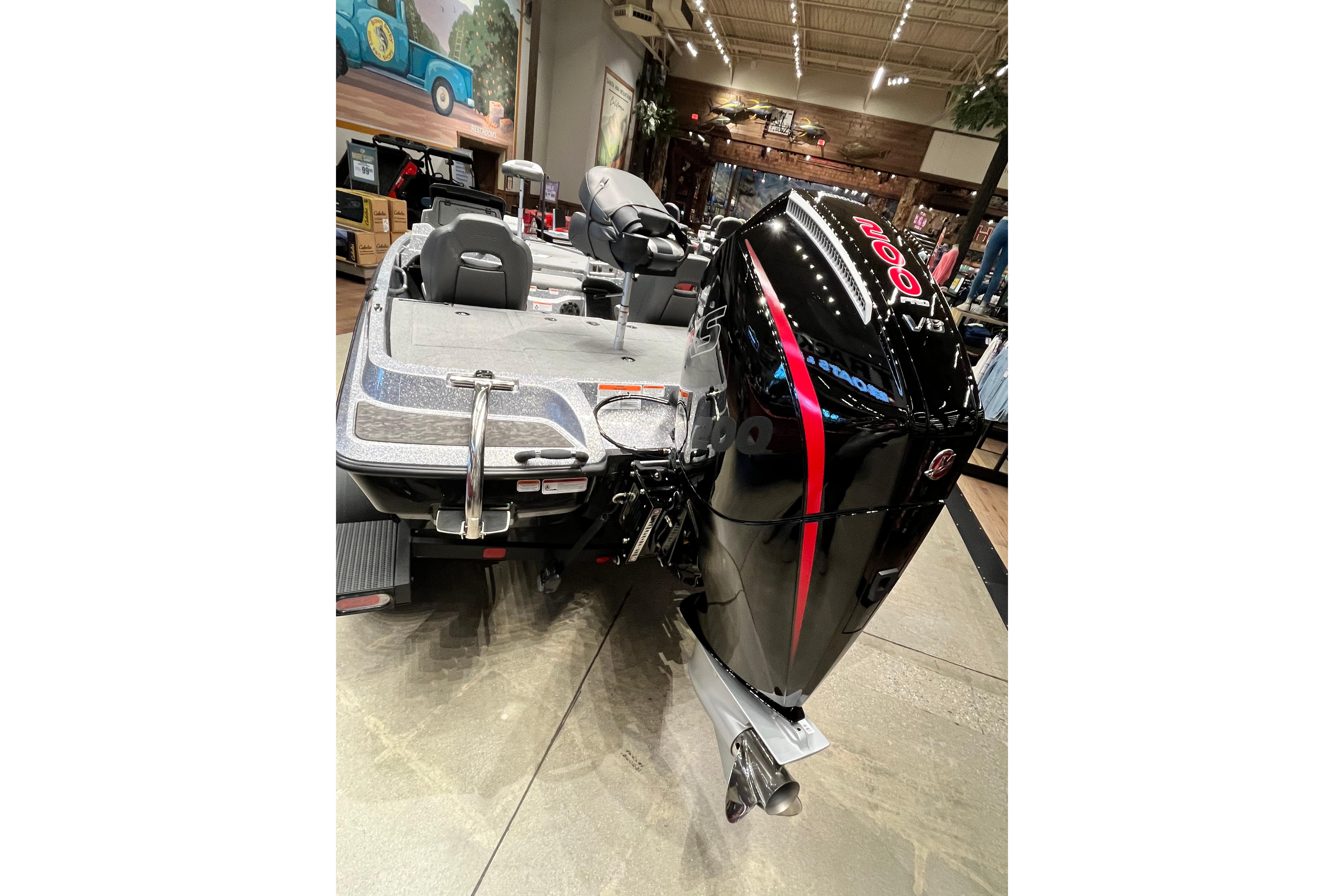2026 Nitro Z19 XL Pro boat with powerful V8 engine displayed indoors.