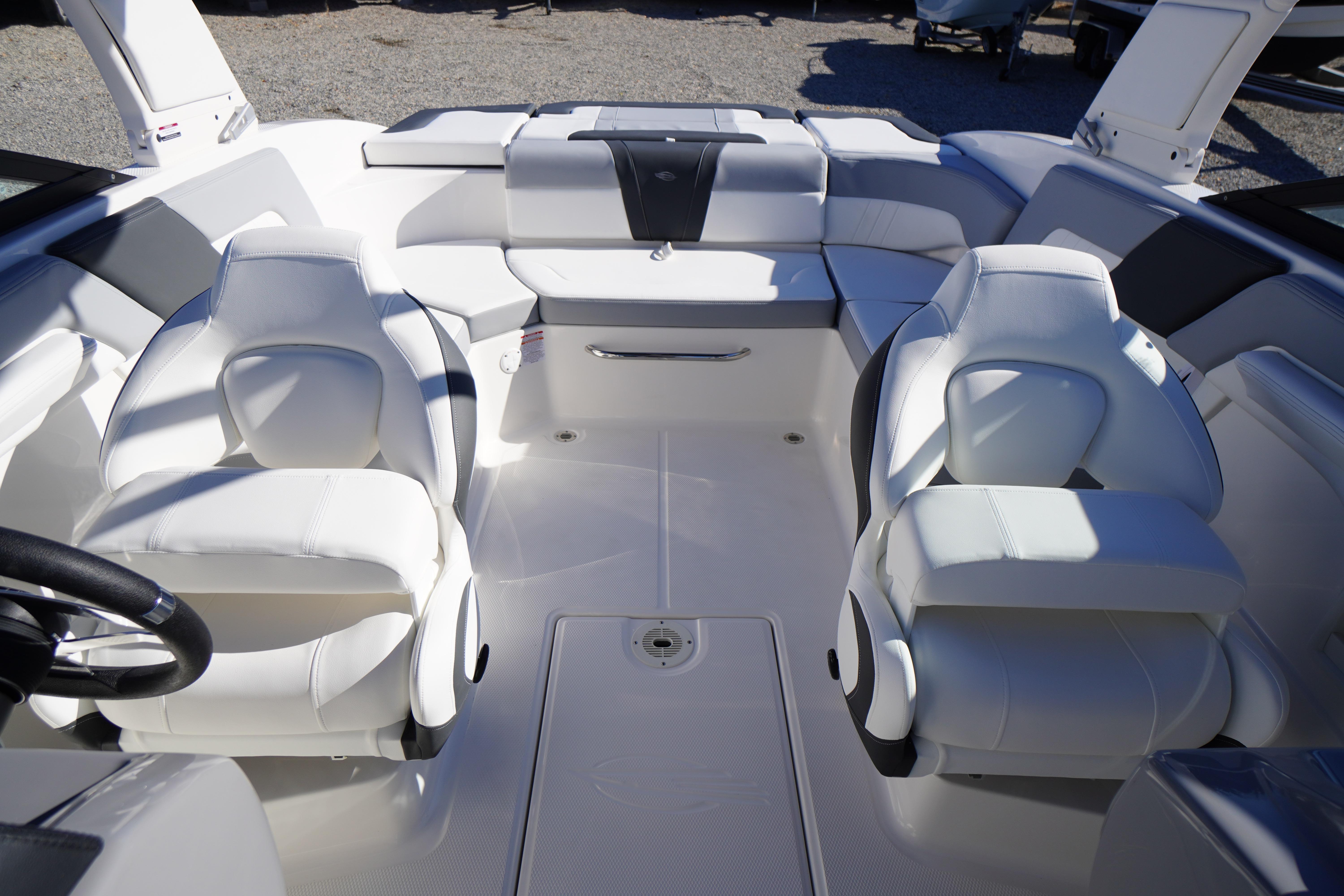 2026 Chaparral 23 SSi boat interior with luxurious white seating and modern design.