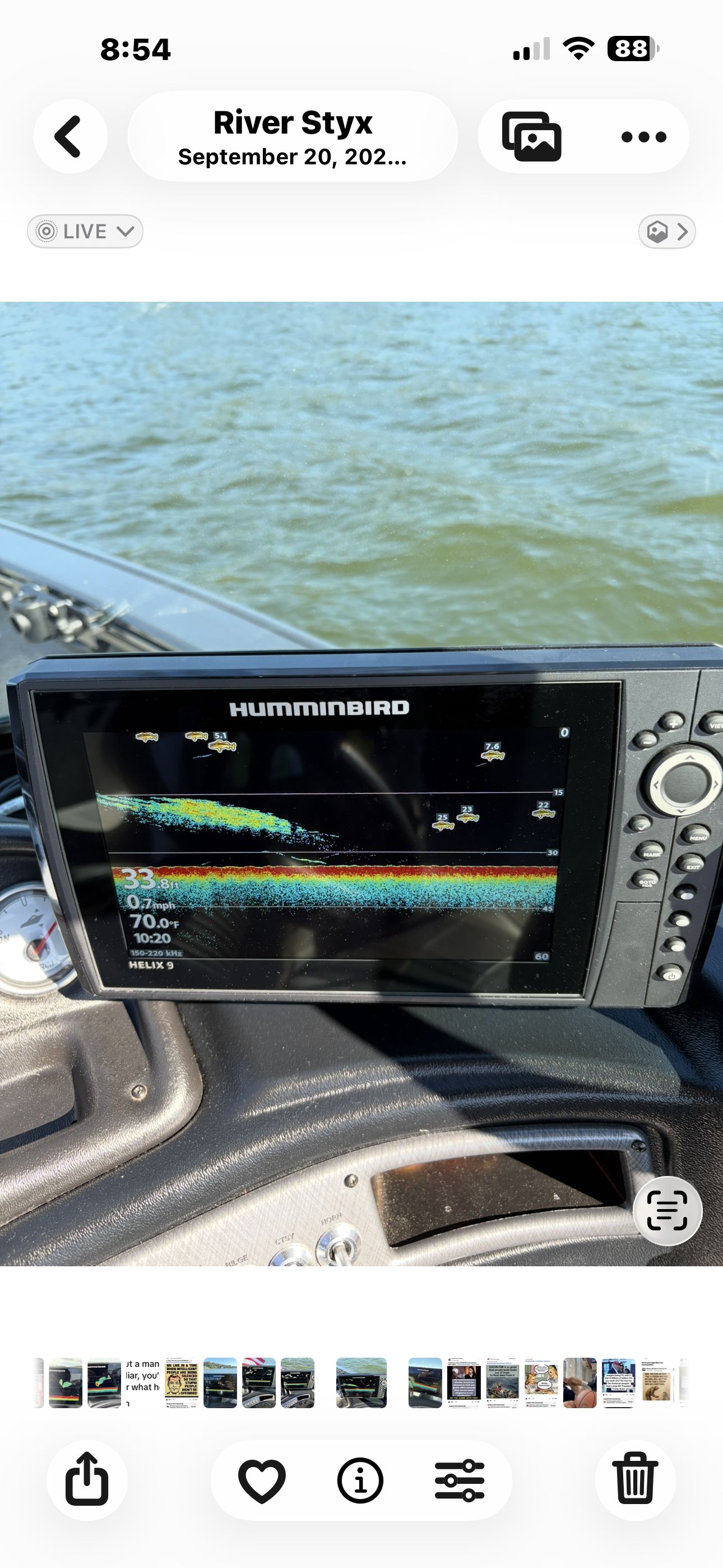 A fish finder on a boat displays fish and water depth.