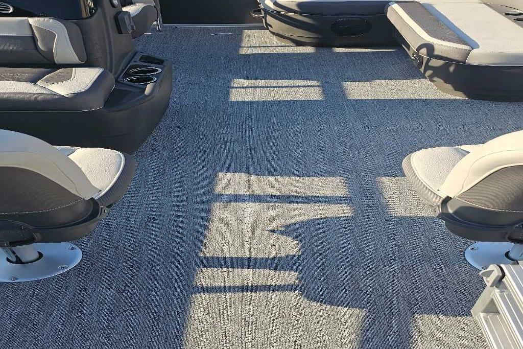 Interior of 2026 Sun Tracker Bass Buggy 16 XL Select pontoon boat with seating.