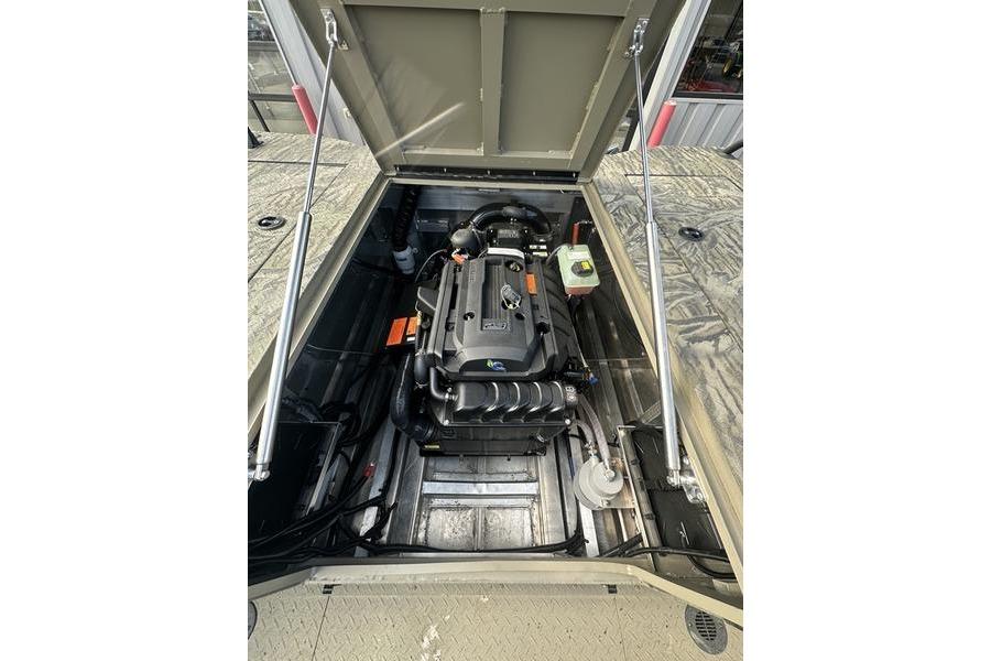 Engine compartment of 2025 SeaArk Predator 300 AK boat, showcasing modern design and components.