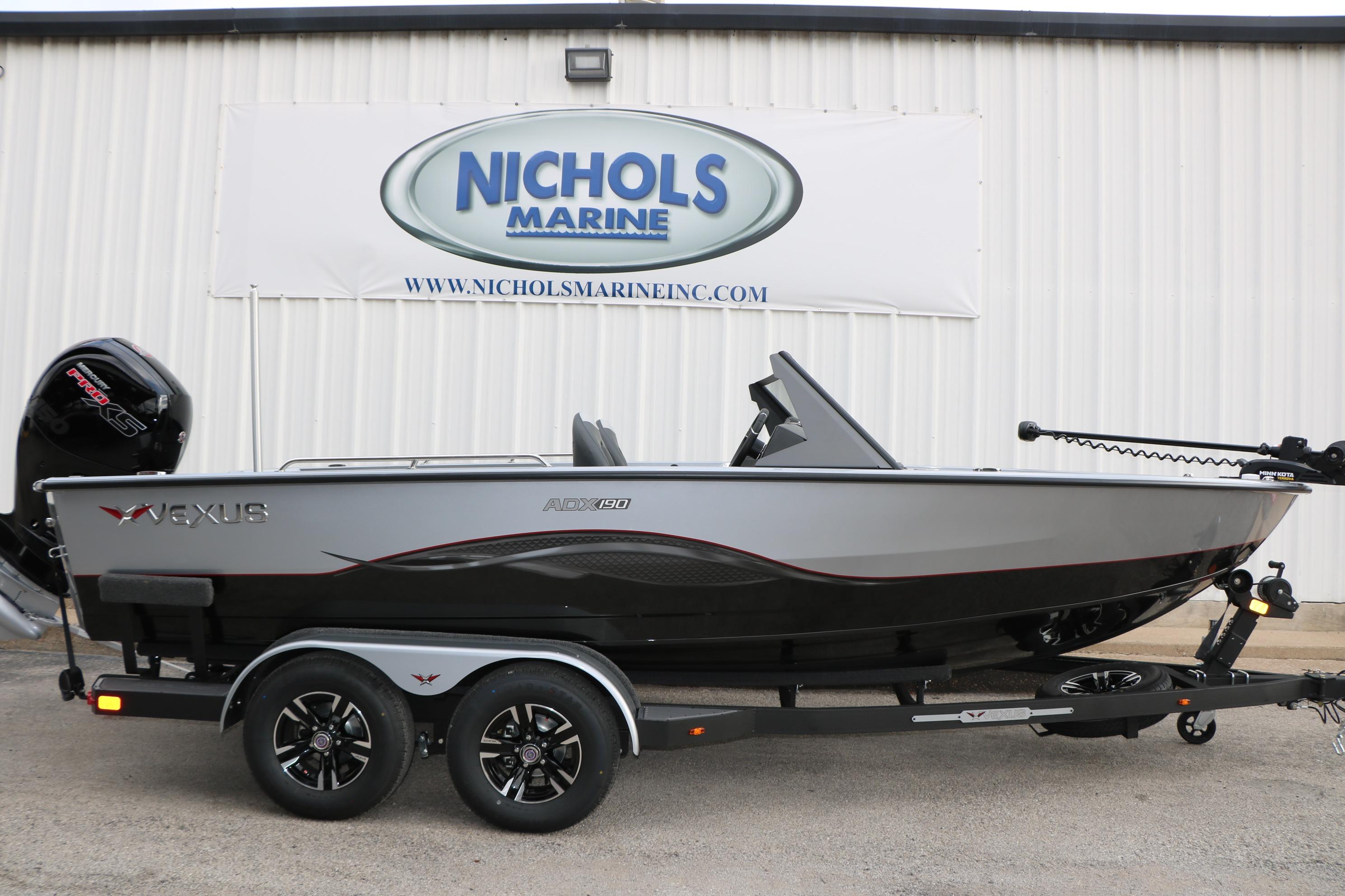2026 Vexus ADX 190 boat on trailer at Nichols Marine dealership.
