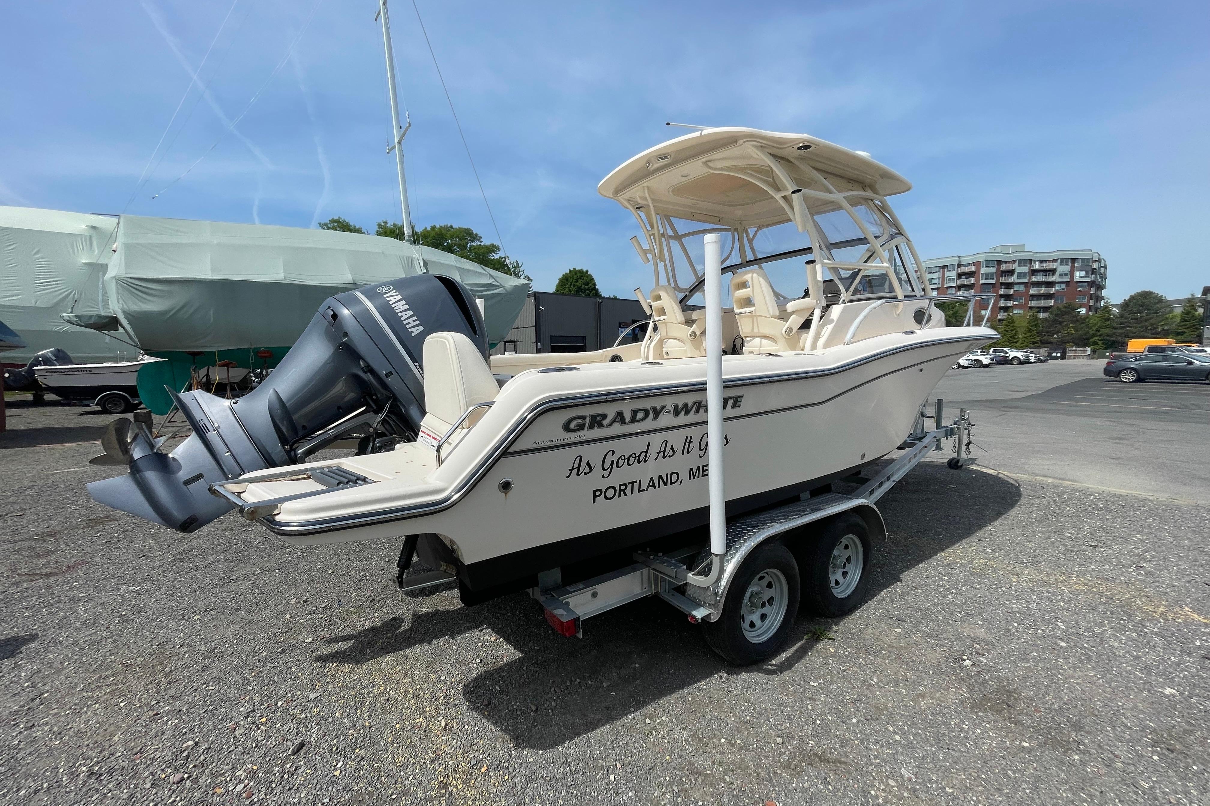 2024 Grady-White Adventure 218 boat on trailer with Yamaha outboard motor.
