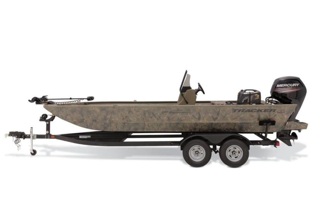 2026 Tracker GRIZZLY® 2072 CC Sportsman boat with camouflage design and Mercury outboard motor.