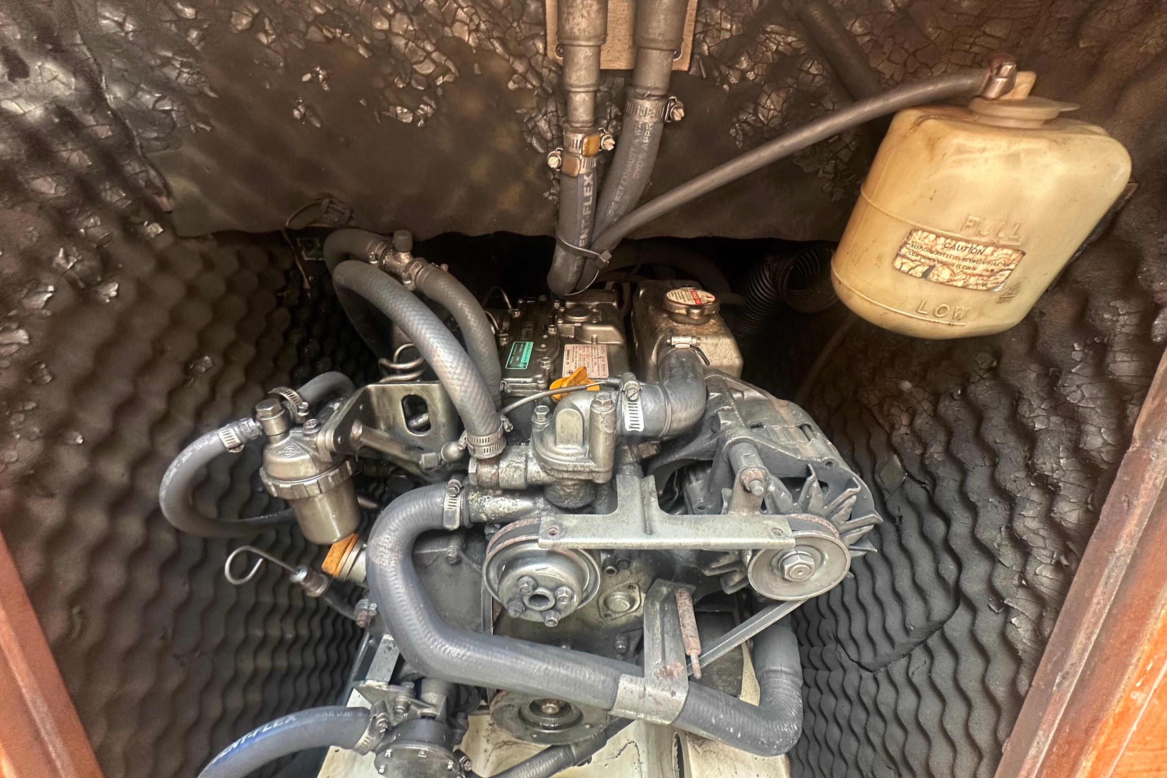 Engine compartment of a 2006 Beneteau Oceanis Clipper 323 sailboat.