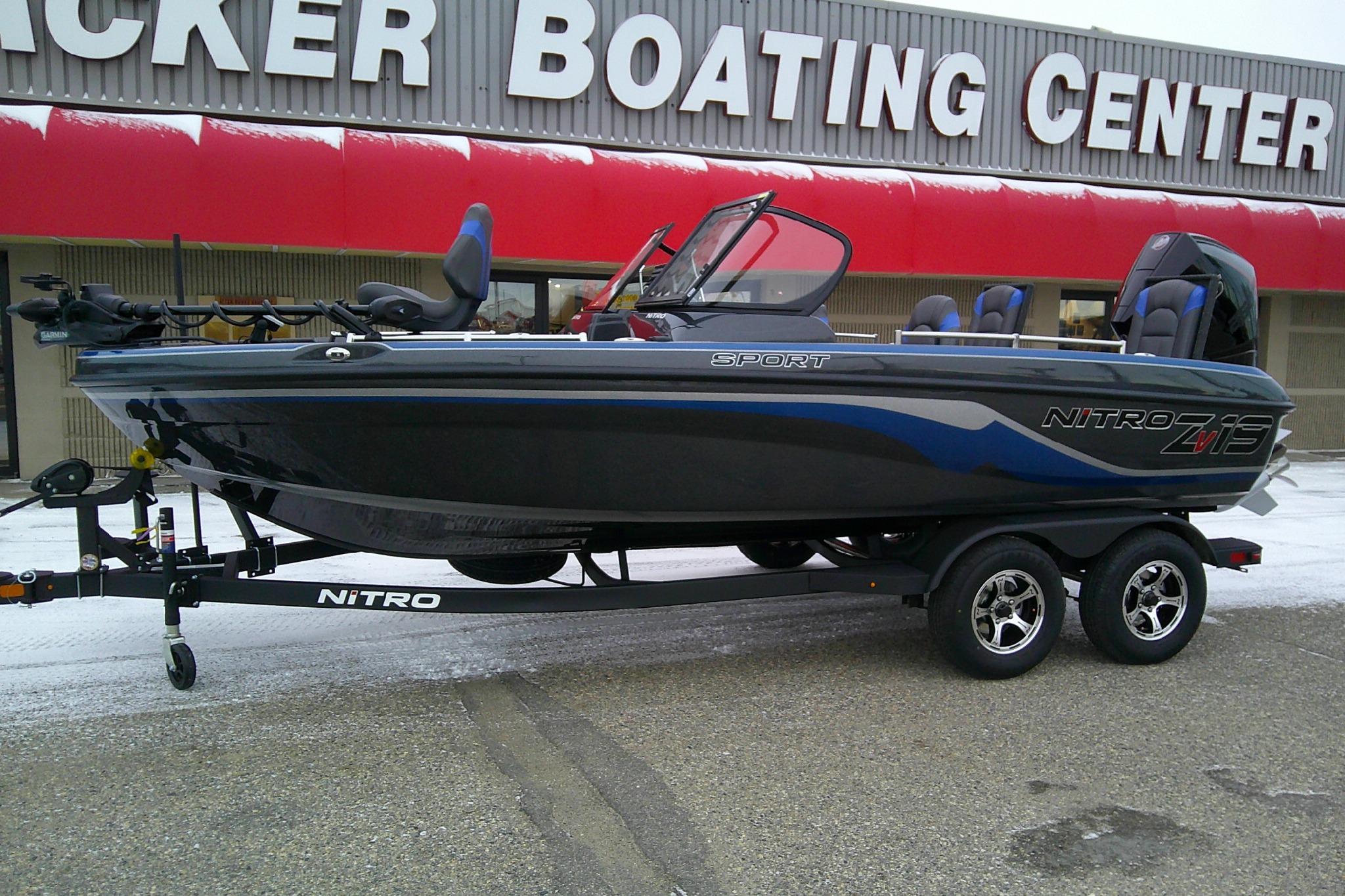 2026 Nitro ZV19 Sport Pro boat on trailer at boating center.