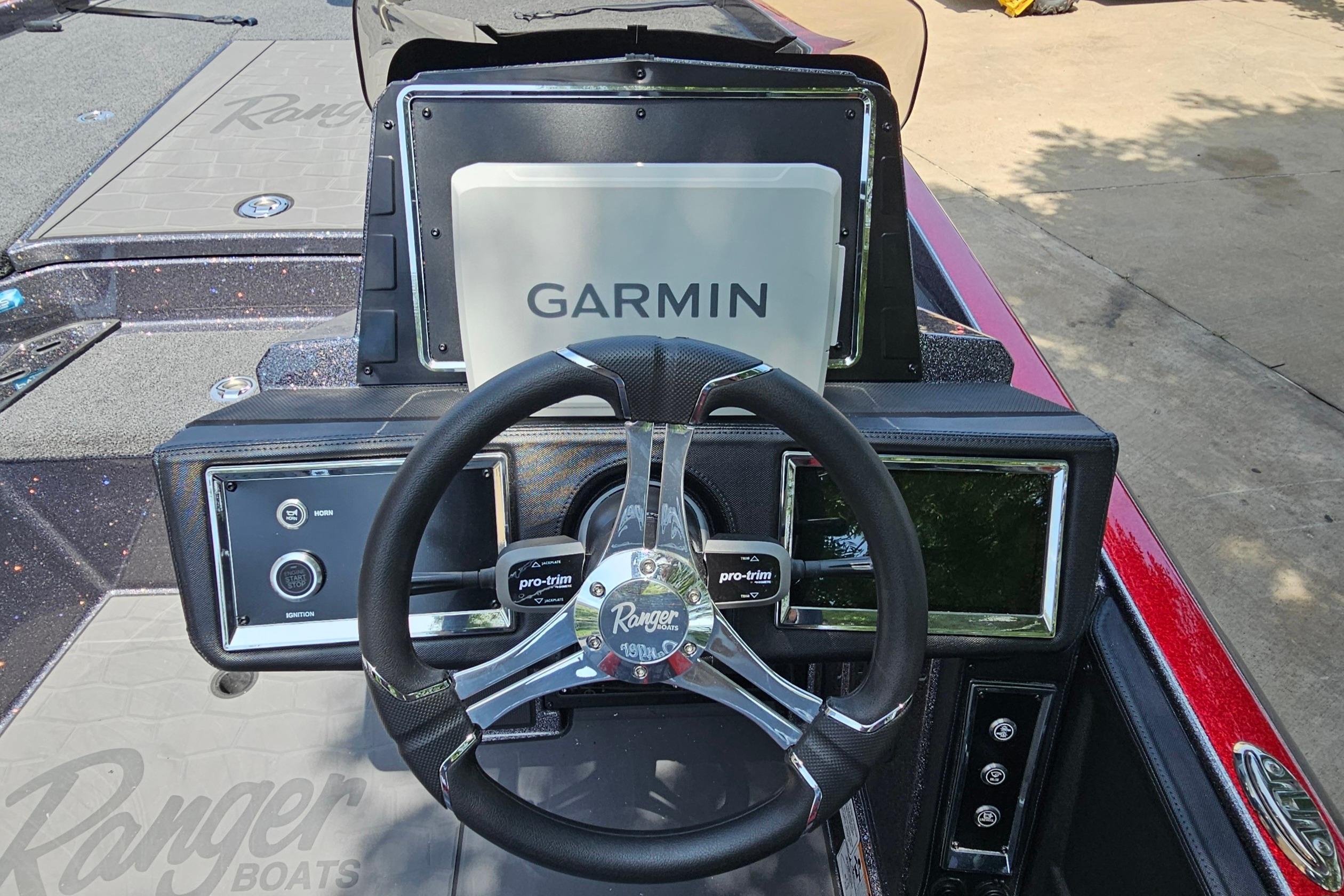 2026 Ranger Z520R boat dashboard with Garmin display and steering wheel.