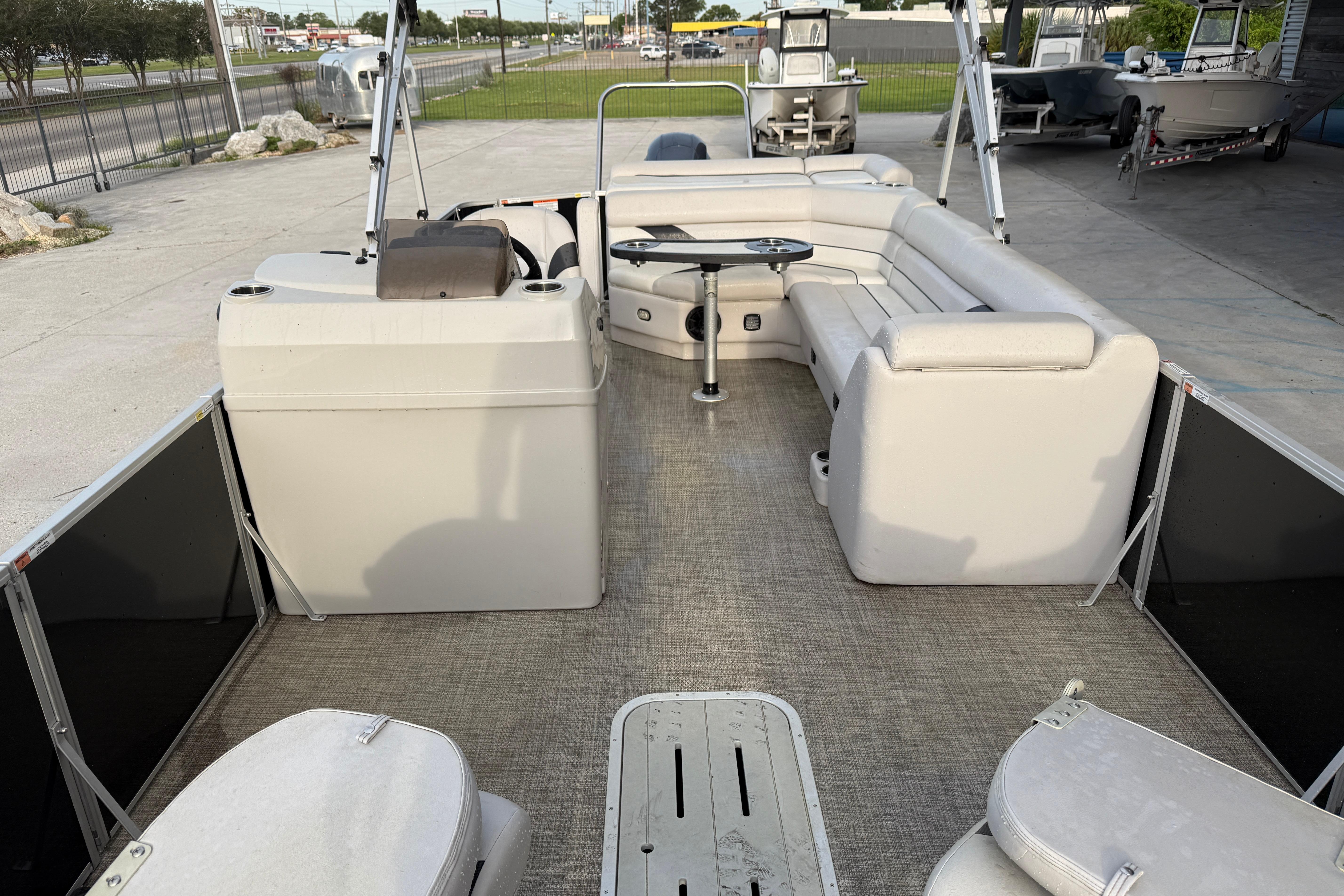 2022 Custom G3 Suncatcher 322FC pontoon boat interior with seating and table.
