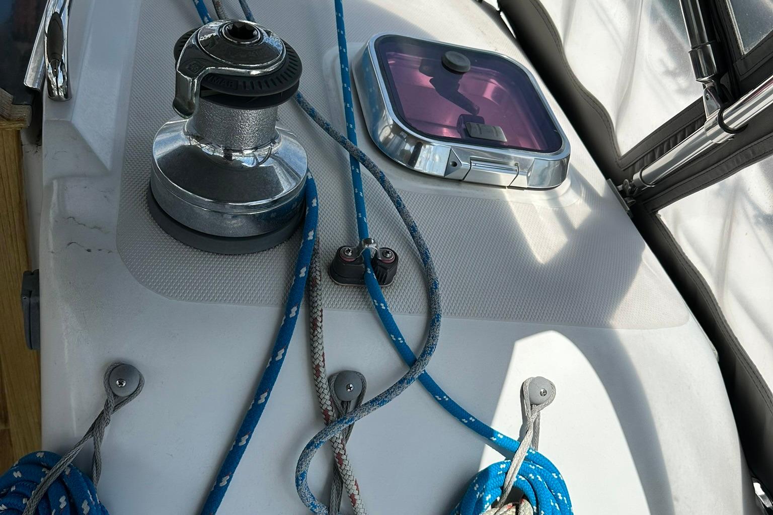 Deck of 2007 Sabre 386 sailboat with winch and ropes.
