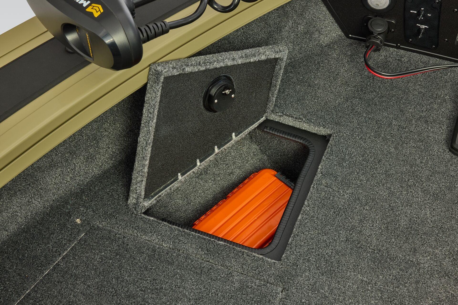 2026 Tracker Targa V-19 Combo boat storage compartment with orange case inside.