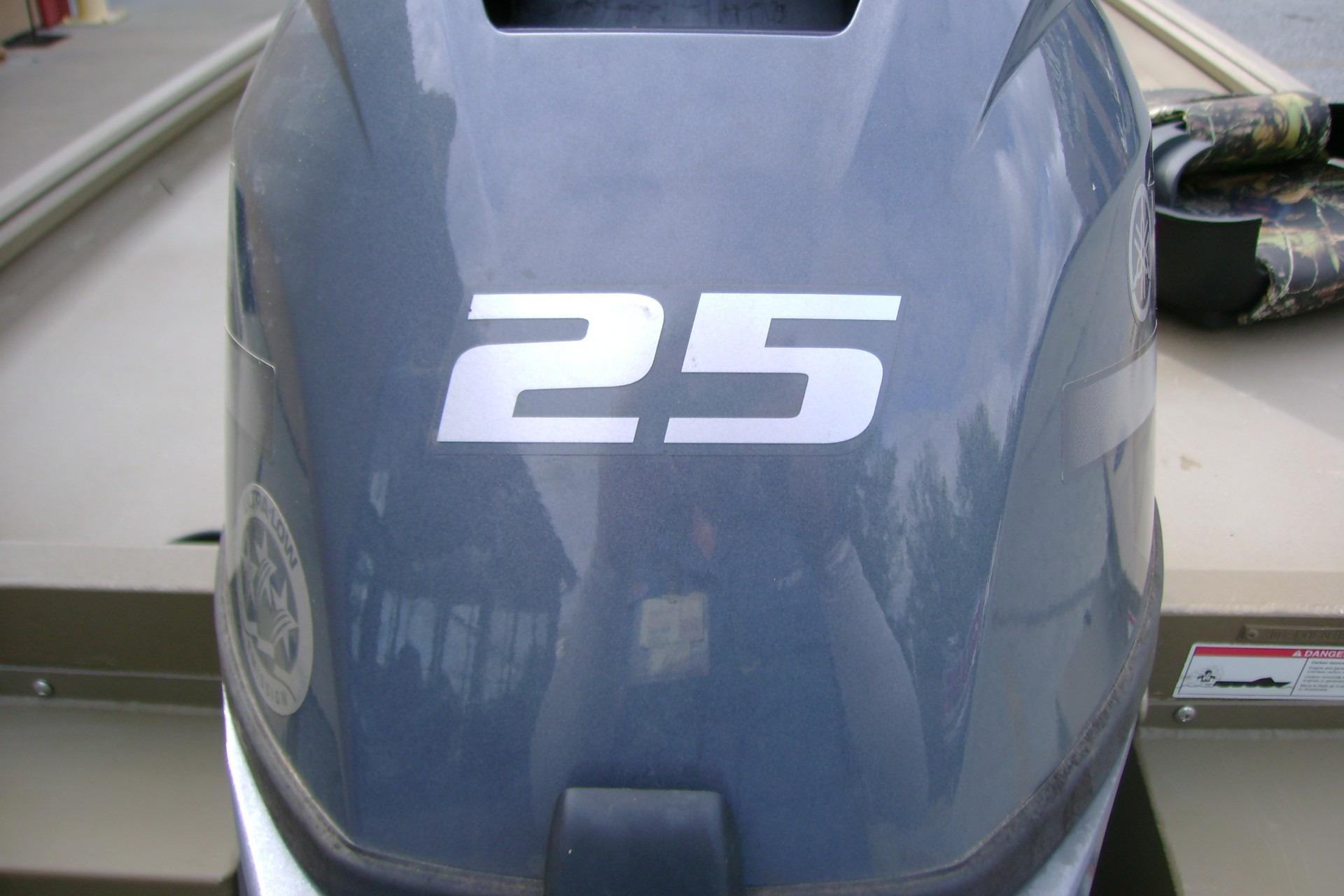 Outboard motor with "25" label on a 2023 G3 1652 DK boat.