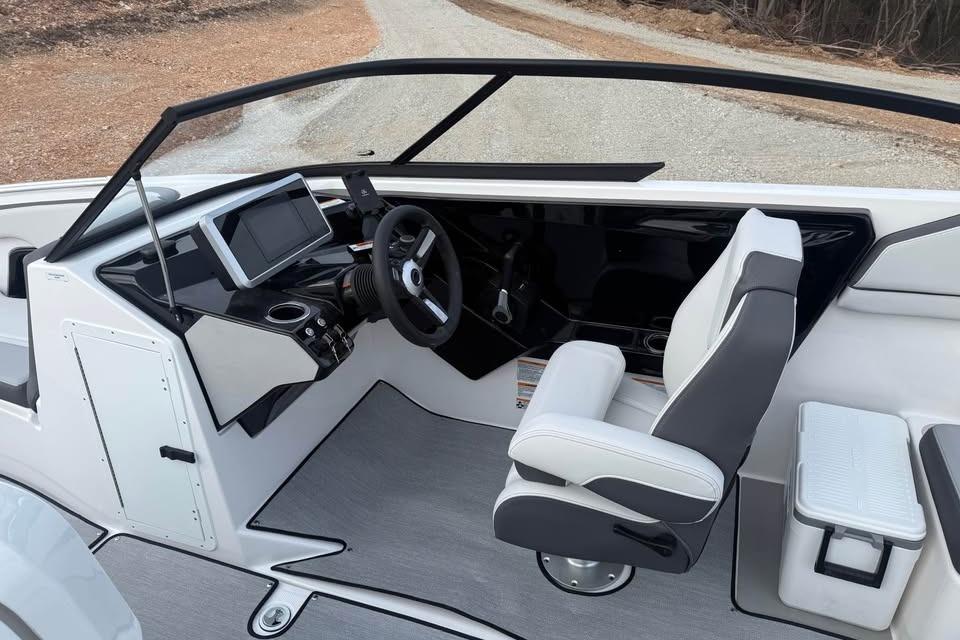 2026 Yamaha Boats AR250 cockpit with modern steering and seating design.