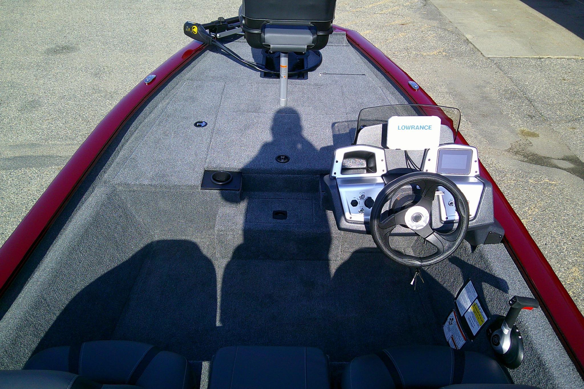 2025 Tracker Pro Team 175 boat interior with steering console and Lowrance electronics.