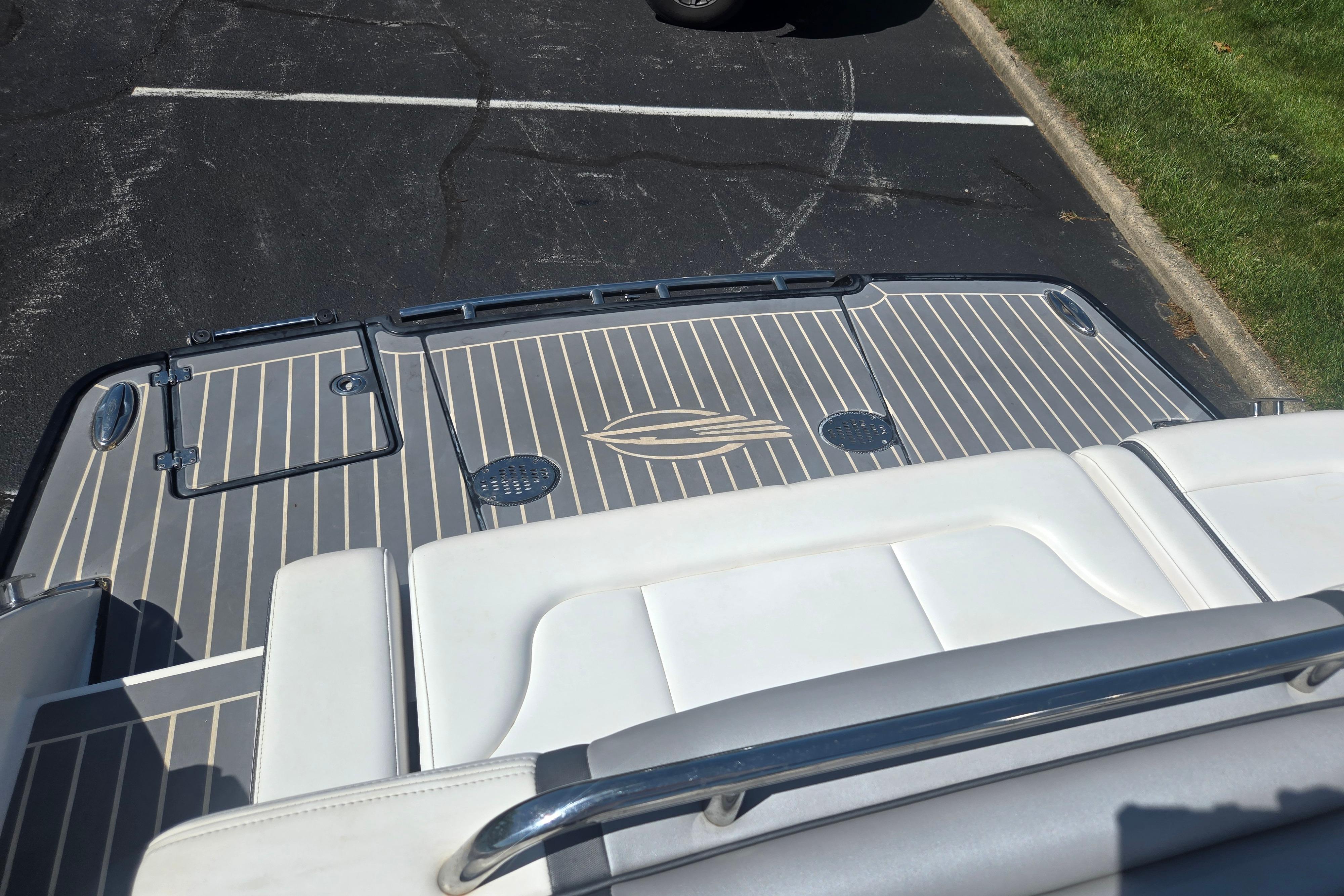 2018 Chaparral 267 SSX boat deck with sleek design and comfortable seating.