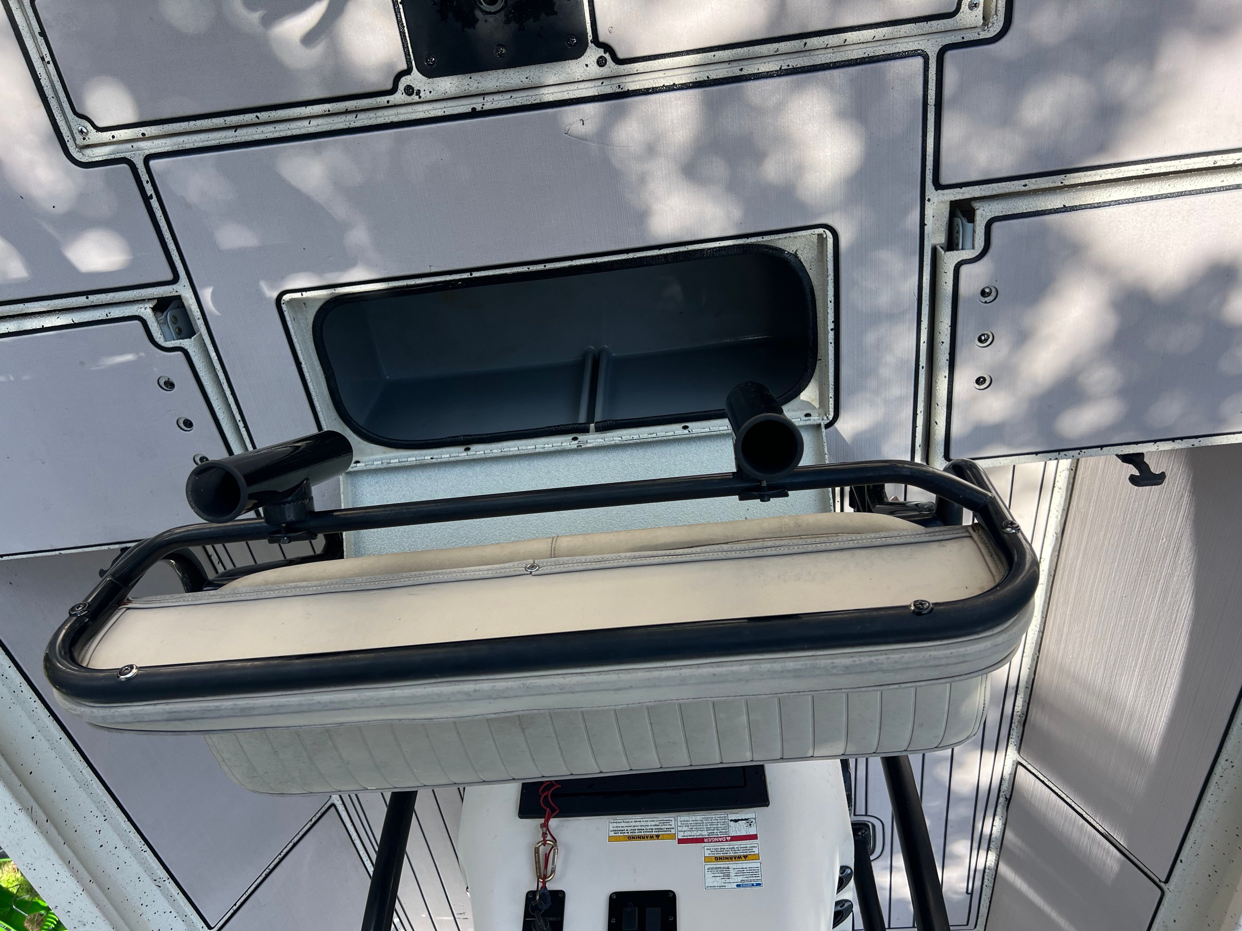 Xpress H24B Bay 2016 boat roof with storage compartments.