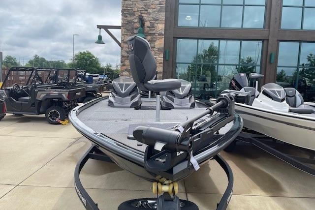 2025 Ranger ALPHA 208 boat parked in front of a building.