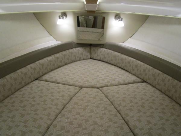 2025 Cutwater C-248 Coupe interior cabin with cushioned seating and ambient lighting.