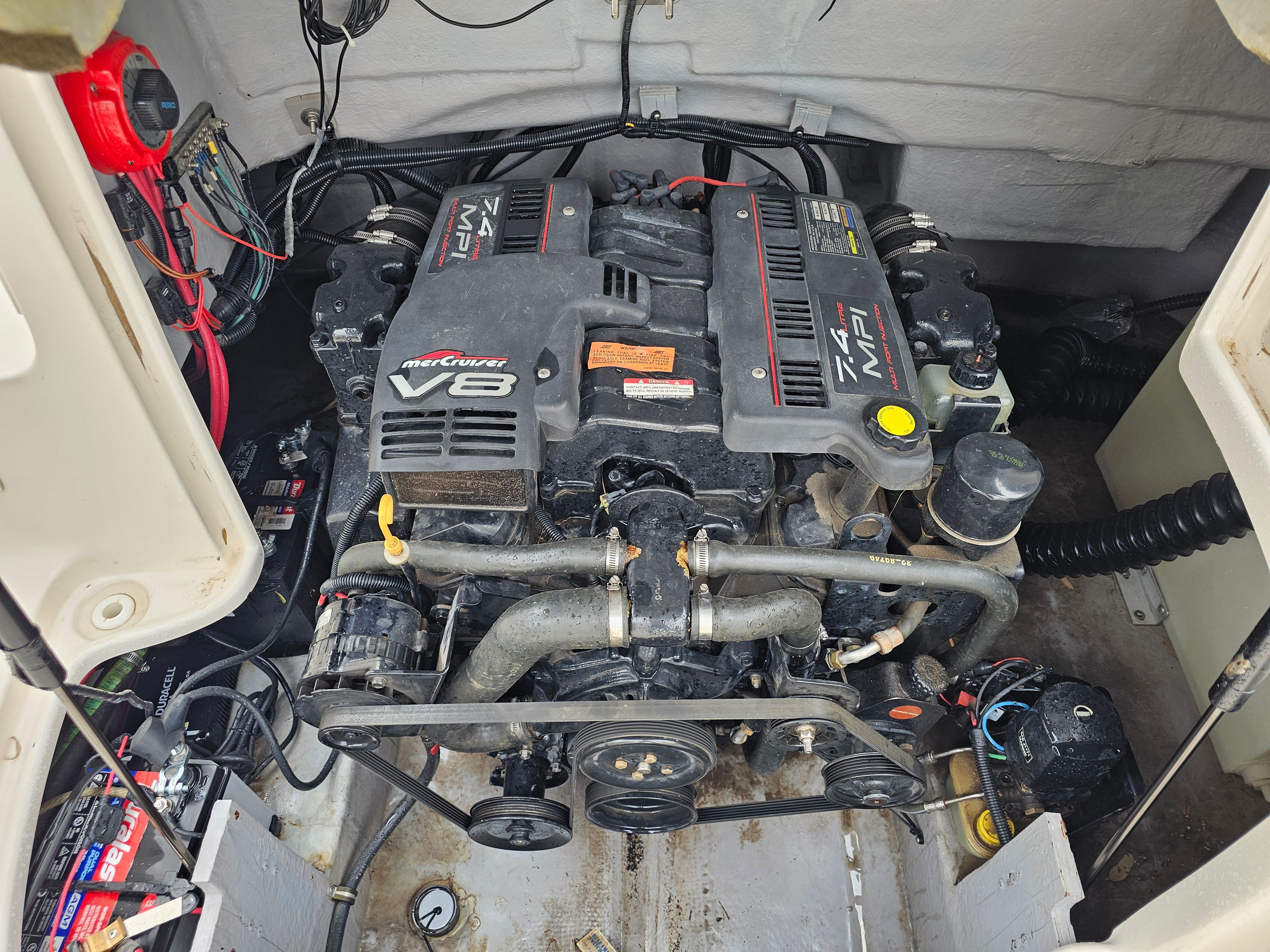 Engine compartment of a 1998 Chaparral Sunesta 252 Special Edition boat.