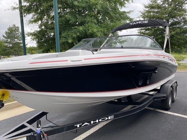 2024 Tahoe 210 Si boat on trailer, black and white with red accents.