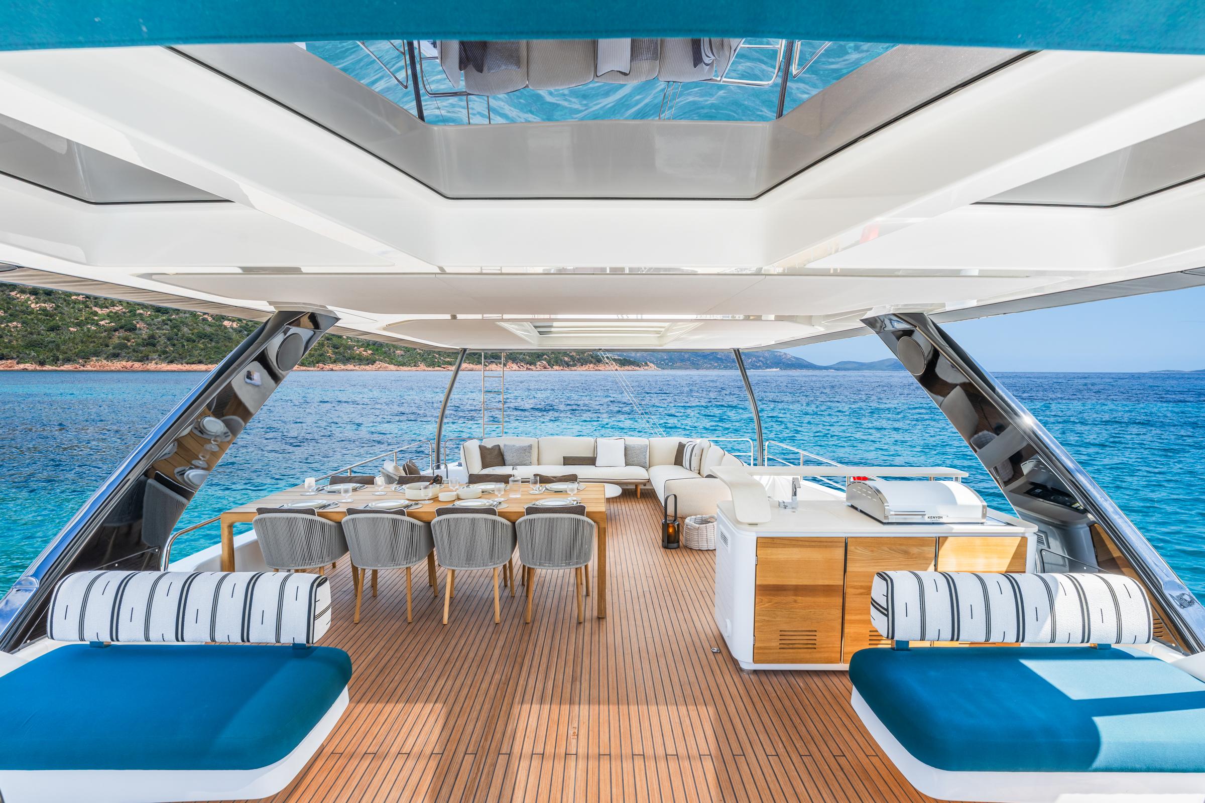 Luxurious Lagoon Eighty 2 yacht interior with elegant seating, dining area, and ocean view, 2025 model.