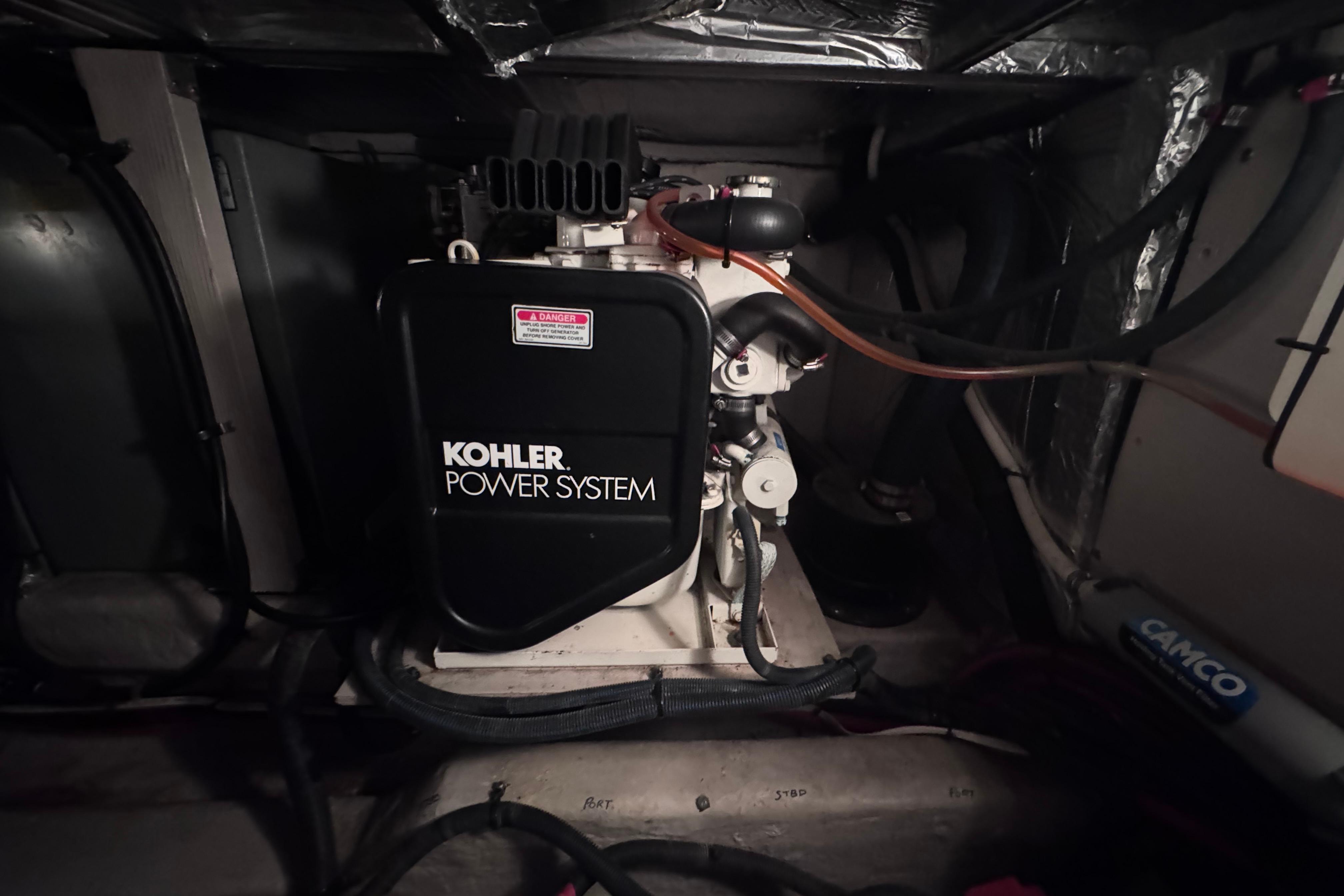 Engine room of 2004 Sea Ray 390 Motor Yacht with Kohler power system.