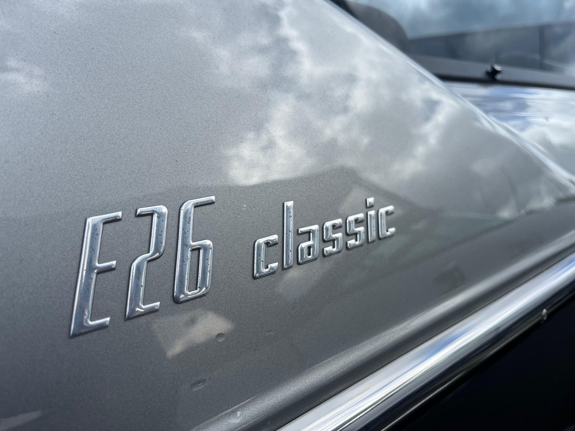 2020 Cranchi E26 Classic boat with sleek metallic finish and logo detail.