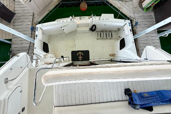 1992 Carver Command Bridge 2828 boat interior, featuring seating and deck area.