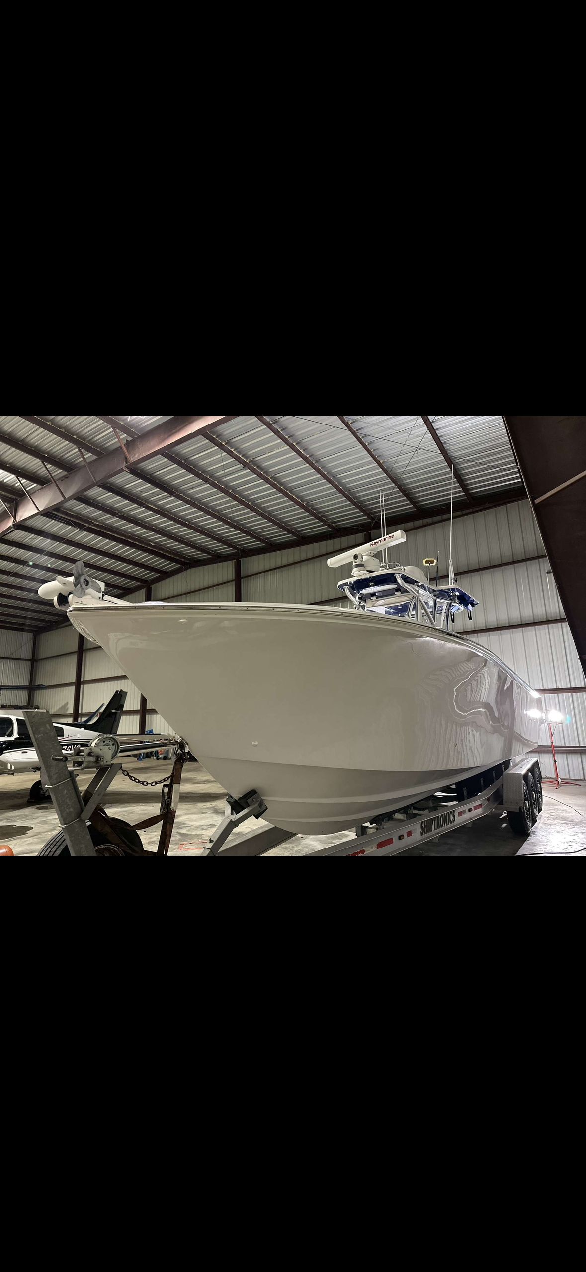 2019 SeaHunter 31 Tournament boat in storage facility.