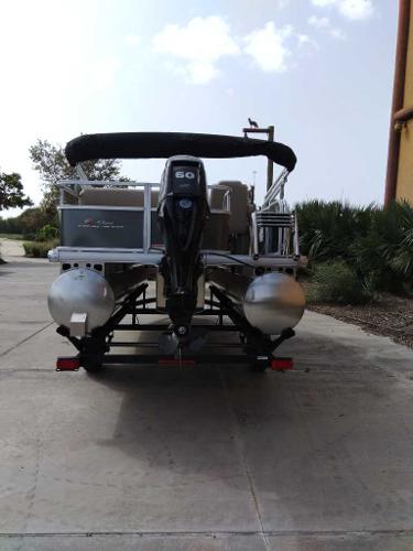 2025 Sun Tracker Party Barge 18 DLX pontoon boat with 60 HP engine.