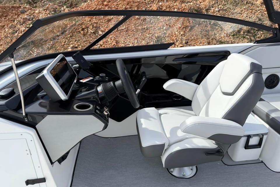 2026 Yamaha Boats AR250 cockpit with modern steering and comfortable seating.