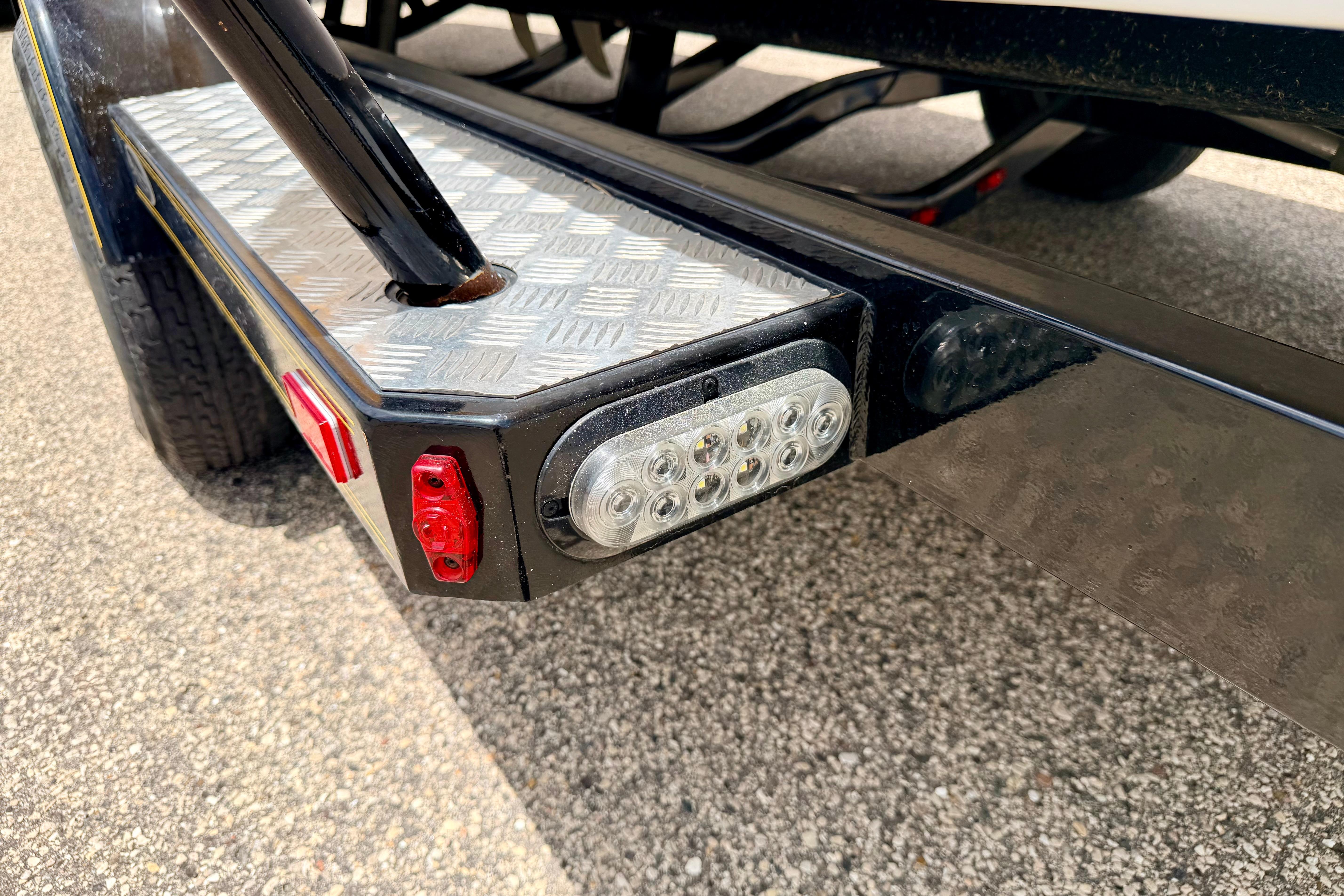 Trailer light and step detail on a 2014 Tigé R20 boat trailer.