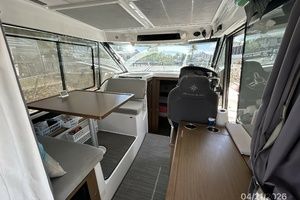 Interior of a 2021 Jeanneau NC 895 yacht with modern amenities.