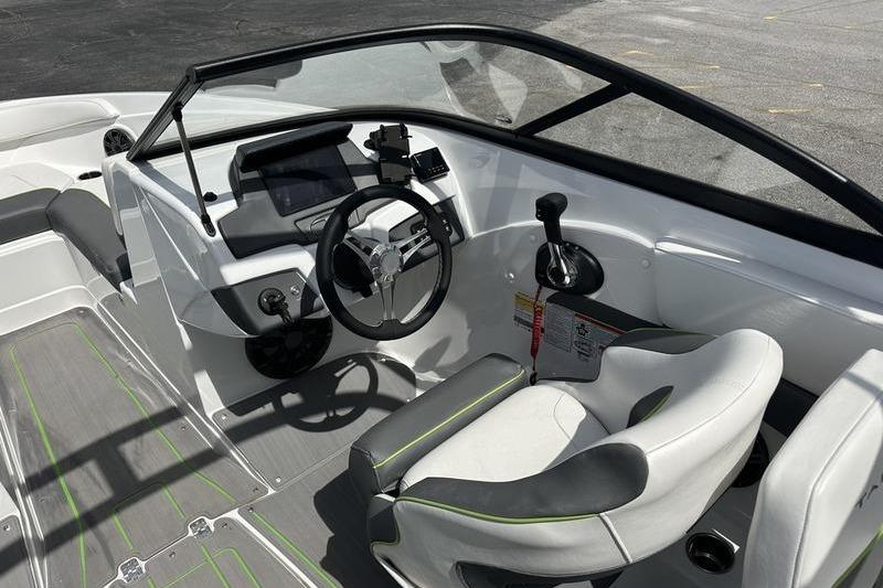2024 Tahoe 210 S boat interior with modern steering and seating.