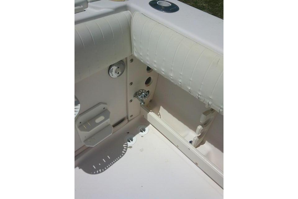 Interior view of a 2000 Grady-White Sailfish 272 boat, featuring seating and fixtures.