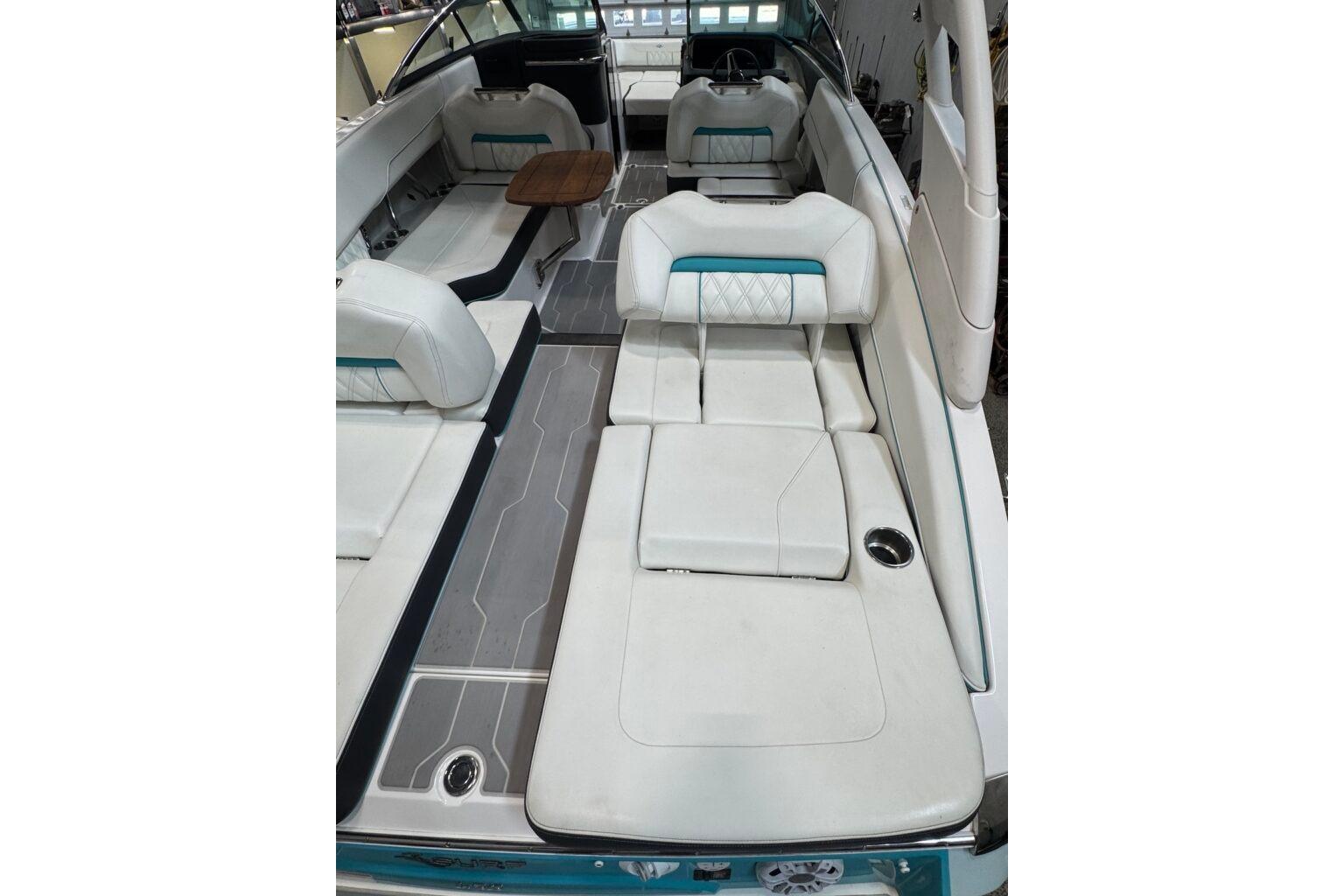 2022 Regal LS6 Surf boat interior with white seating and modern design.