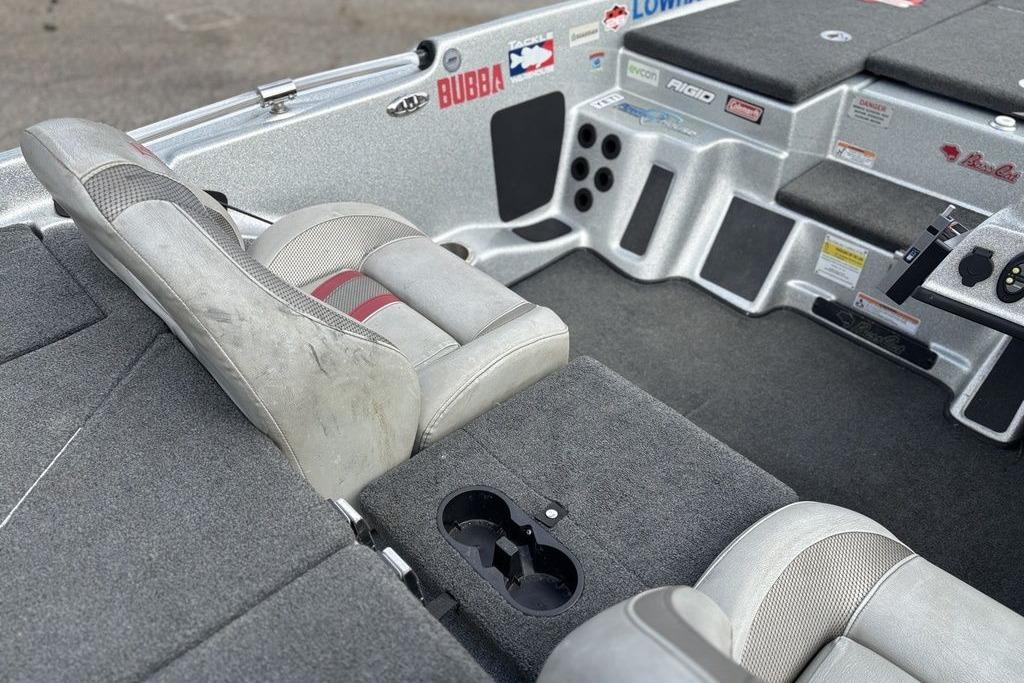 2020 Bass Cat Cougar FTD boat interior with gray seating and control panel.