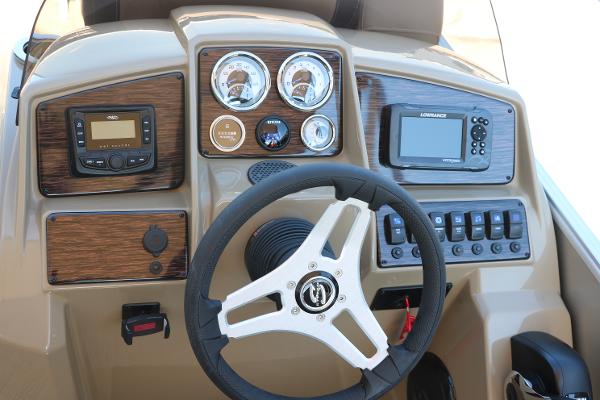 Dashboard of 2025 Sylvan Mirage 820 CLZ DH with steering wheel and control panels.