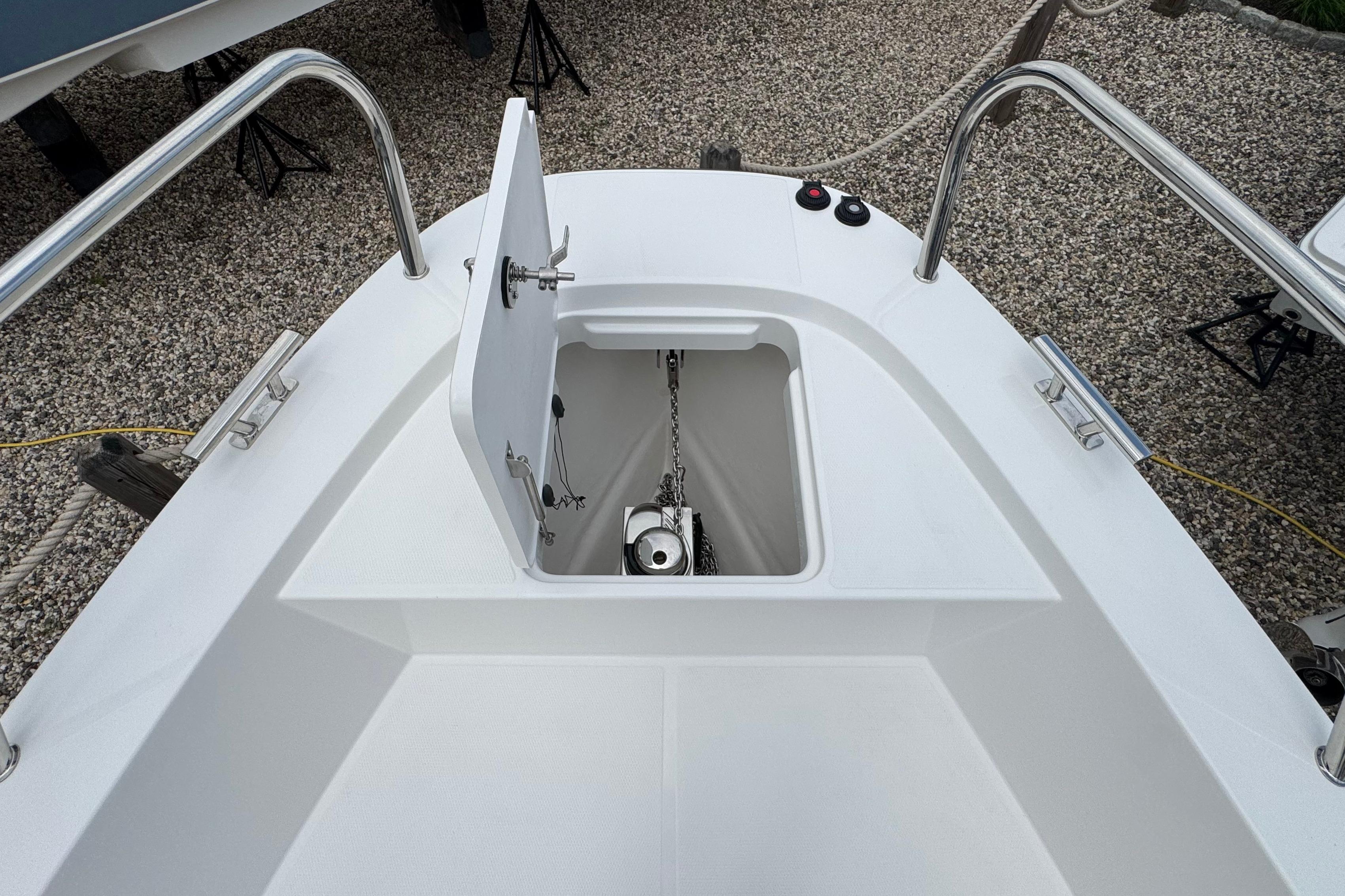 The image shows the anchor locker of a 2026 Nimbus Commuter 9 boat.