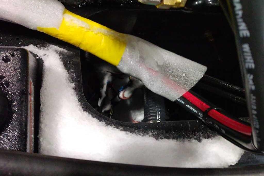 Close-up of wiring and insulation in a 2026 Tracker Targa V-18 Combo boat.