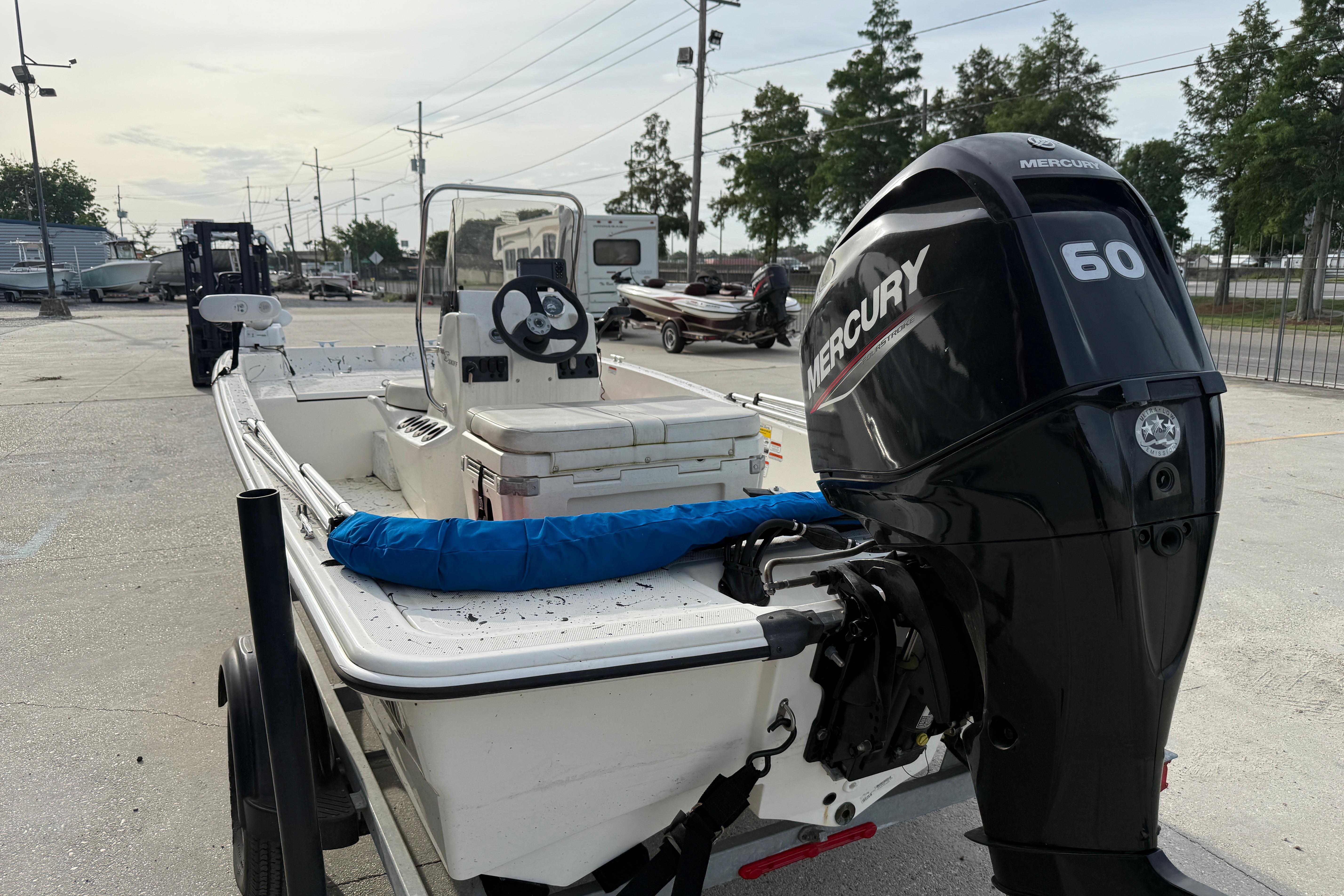 2020 Mako Pro Skiff 15 CC with Mercury 60 engine in a parking lot.