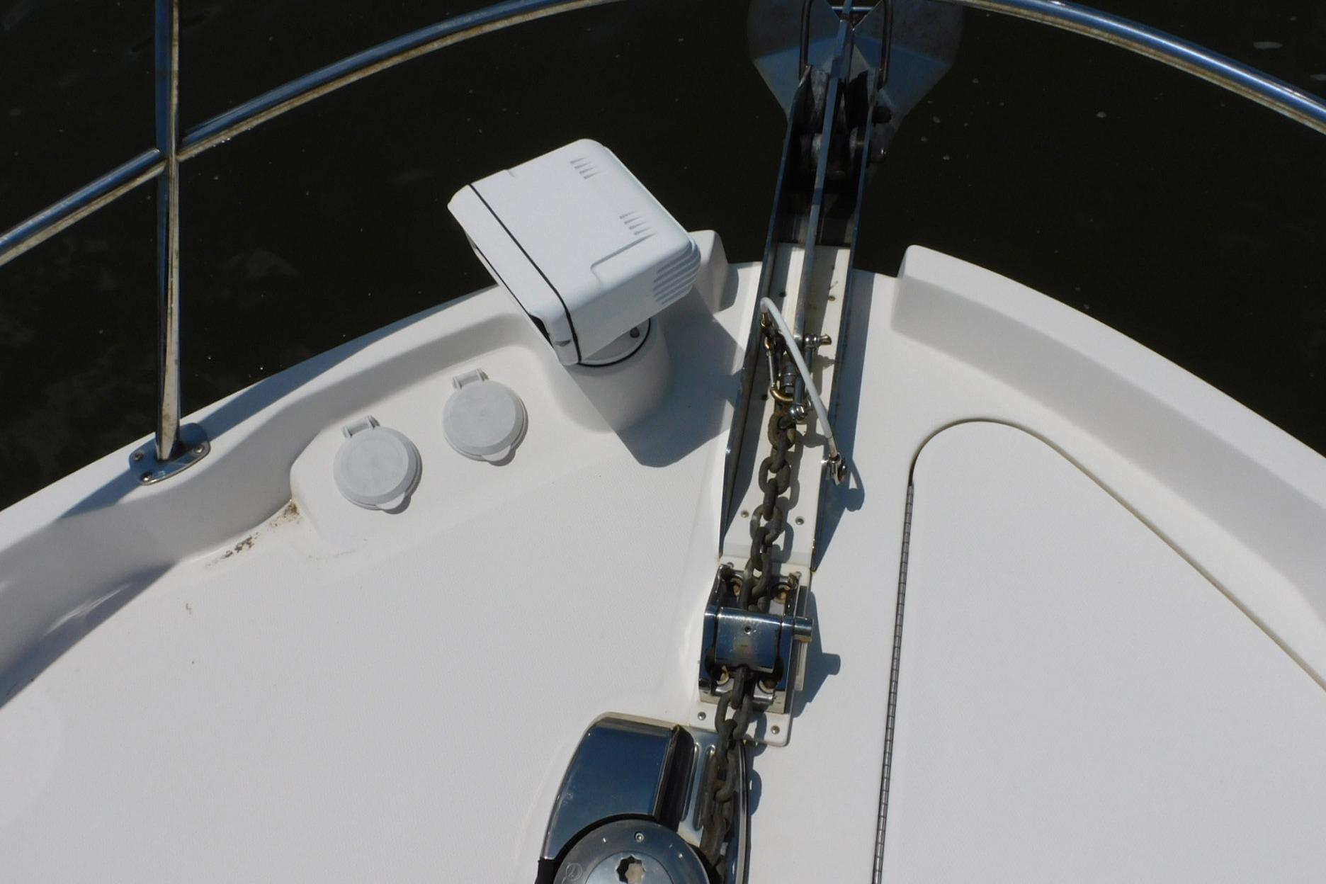Bow of 2019 Sea Ray L550 yacht with anchor chain and winch system.