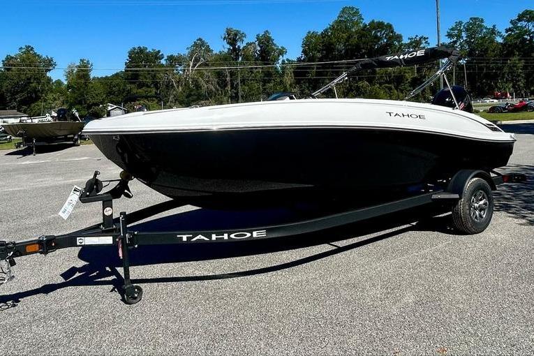 2025 Tahoe T18 boat on trailer in outdoor setting.