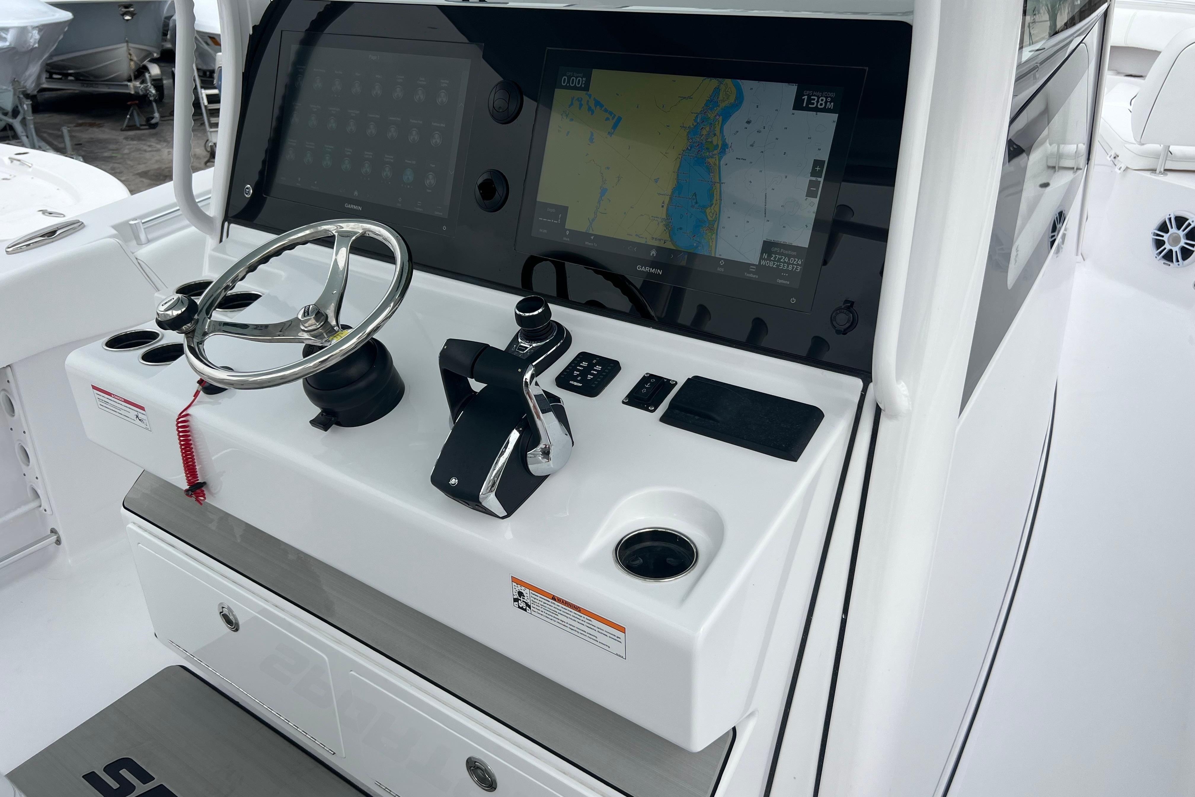 2026 Sportsman Open 352 Center Console dashboard with steering wheel and navigation display.