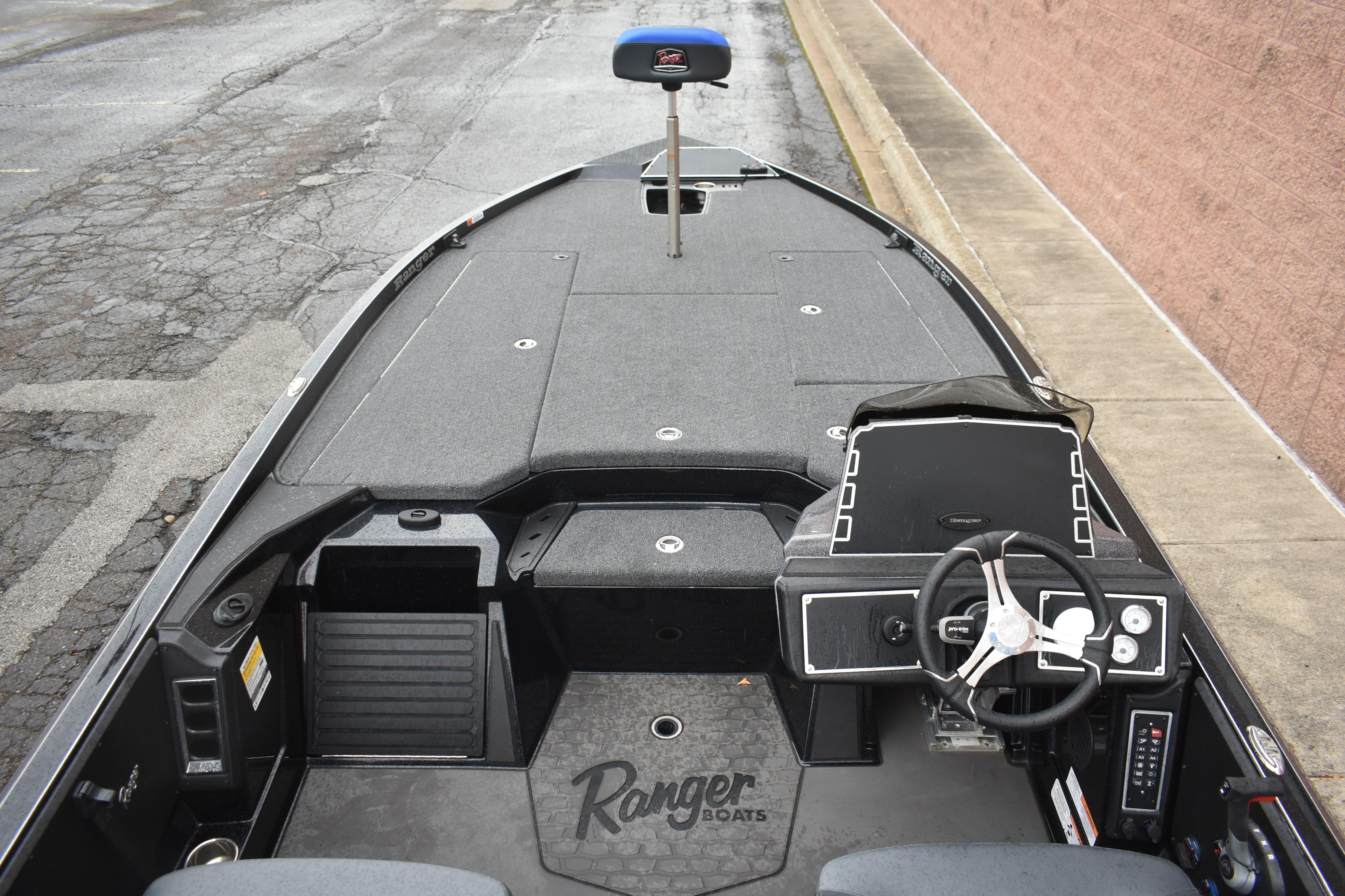 2025 Ranger Z521 boat interior with steering wheel and spacious deck layout.