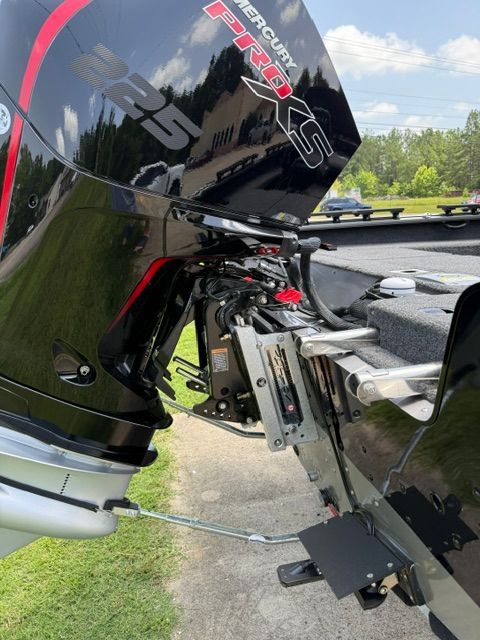 Close-up of a Mercury Pro XS 225 outboard motor on a Lund 2075 Impact XS boat.