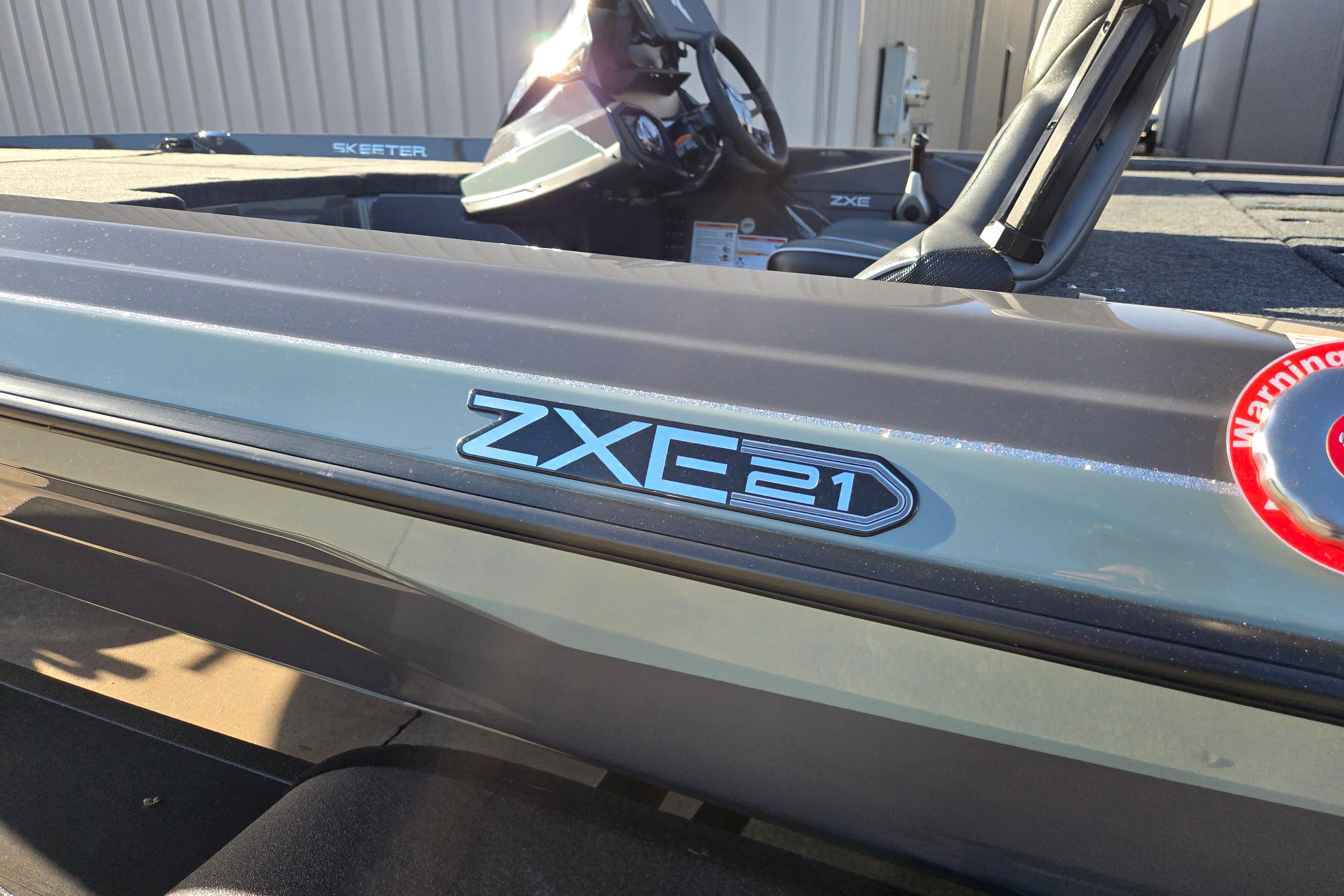 2026 Skeeter ZXE21 boat, close-up of model emblem and interior details.