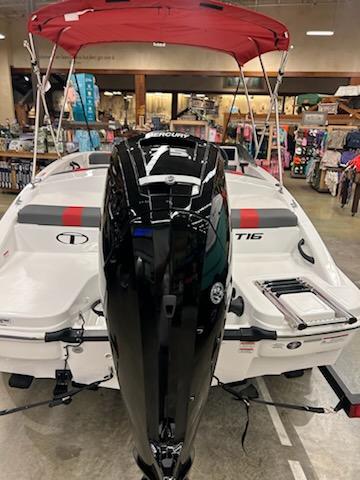 2025 Tahoe T16 boat with red canopy and powerful Mercury outboard motor.