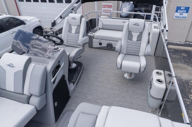 2026 SunCatcher Elite 326 SL pontoon boat interior with luxurious seating and modern design.