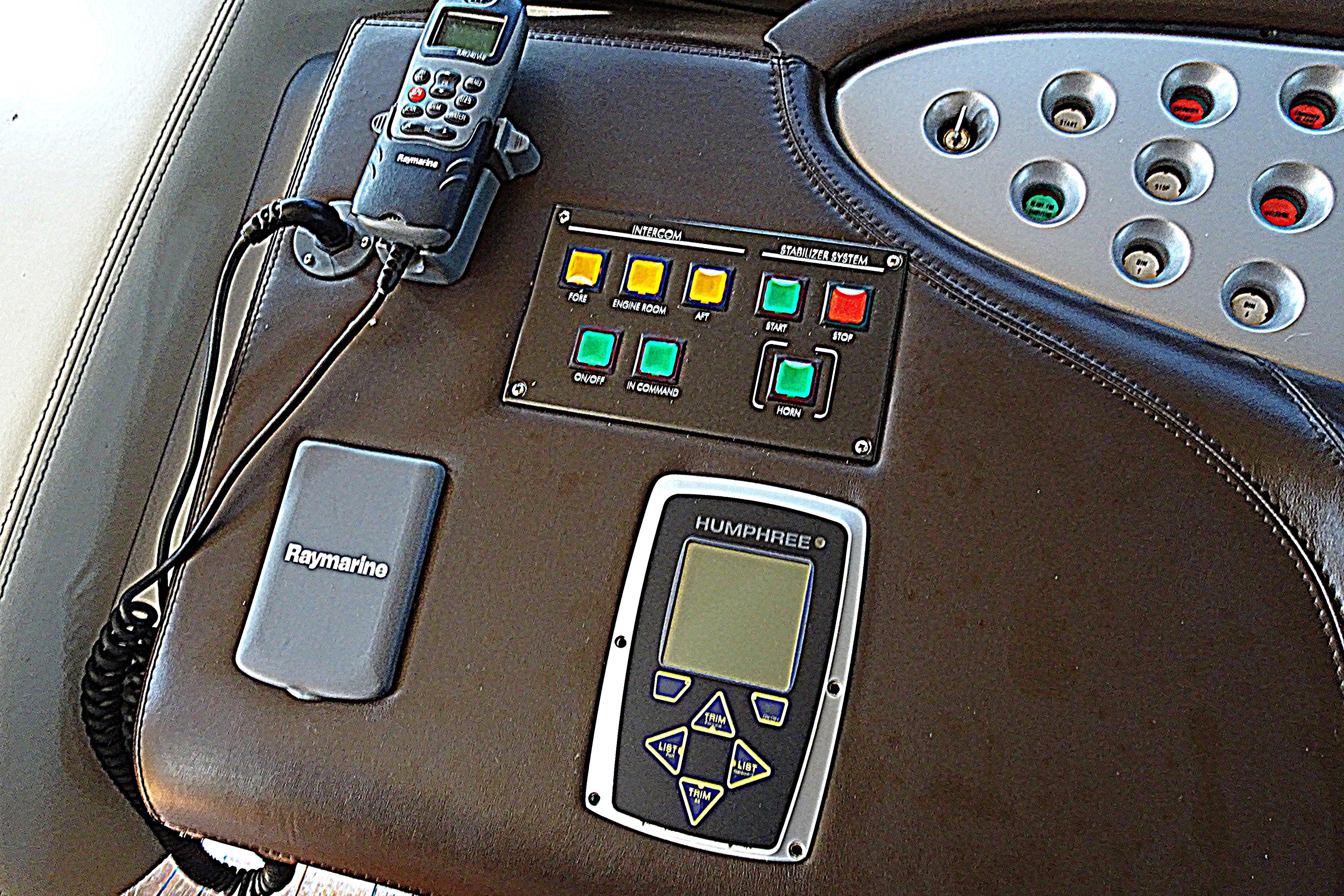 Control panel of a 2010 Azimut 100 Leonardo yacht with Raymarine and Humphree systems.